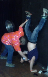 This is George drinking beer while doing a handstand...